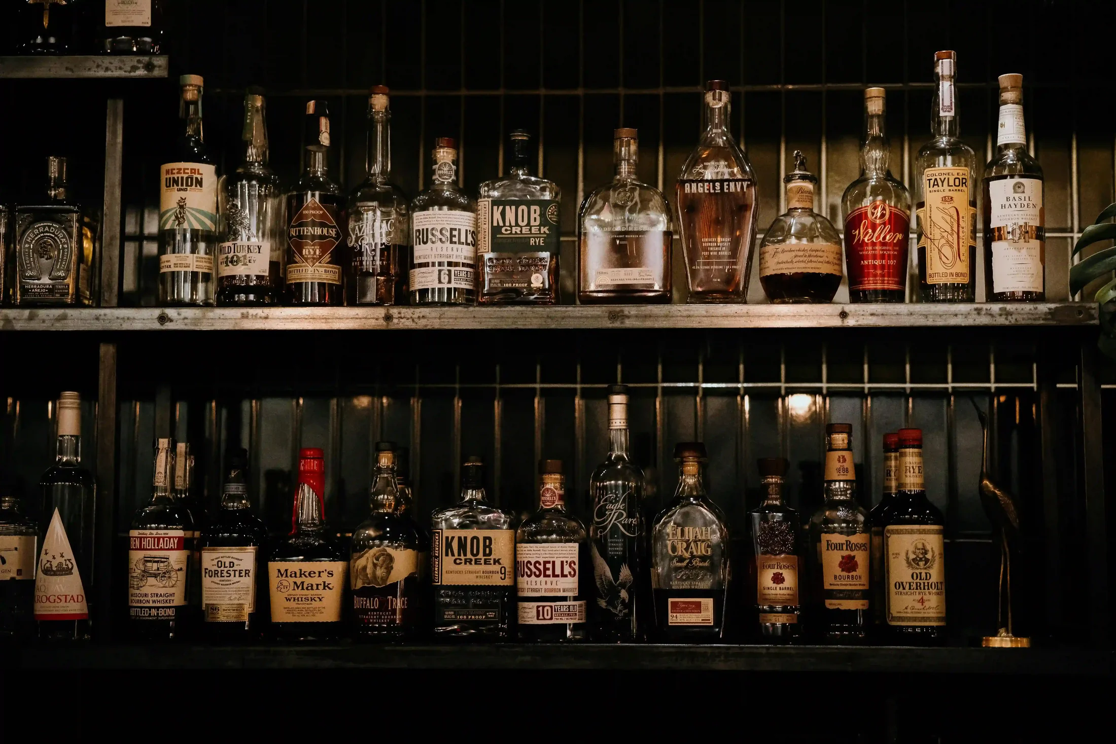 Whisky and bourbon shelf at an ABLO Liquor store in Calgary